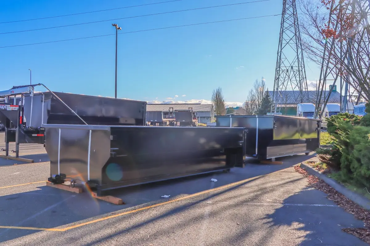 Roll-off dumpster ready for waste disposal at job site for 6 Yard Dumpster Rental in College